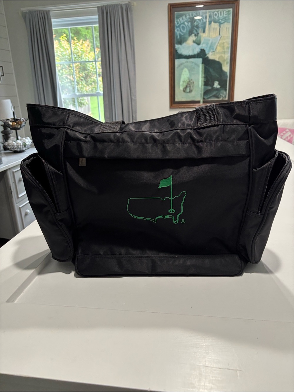 The Master’s officially licensed Black Tote Bag with Green Golf Flag Logo